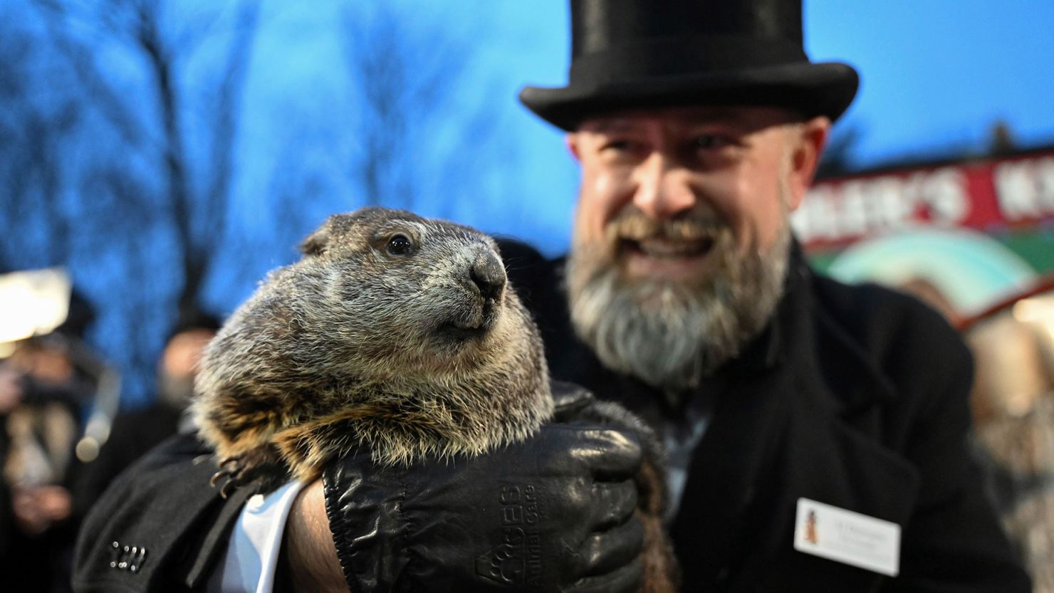 Groundhog Club handler A.J. Dereume holds Punxsutawney Phil, the weather prognosticating groundhog, during the 138th celebration of Groundhog Day on Gobbler's Knob in Punxsutawney, Pennsylvania on Friday, February 2, 2024.