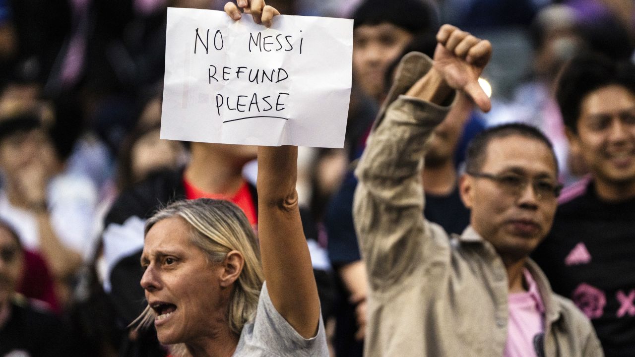 Fans react during the friendly soccer match between Hong Kong Team and US Inter Miami CF at the Hong Kong Stadium in Hong Kong, Sunday, Feb. 4, 2024.