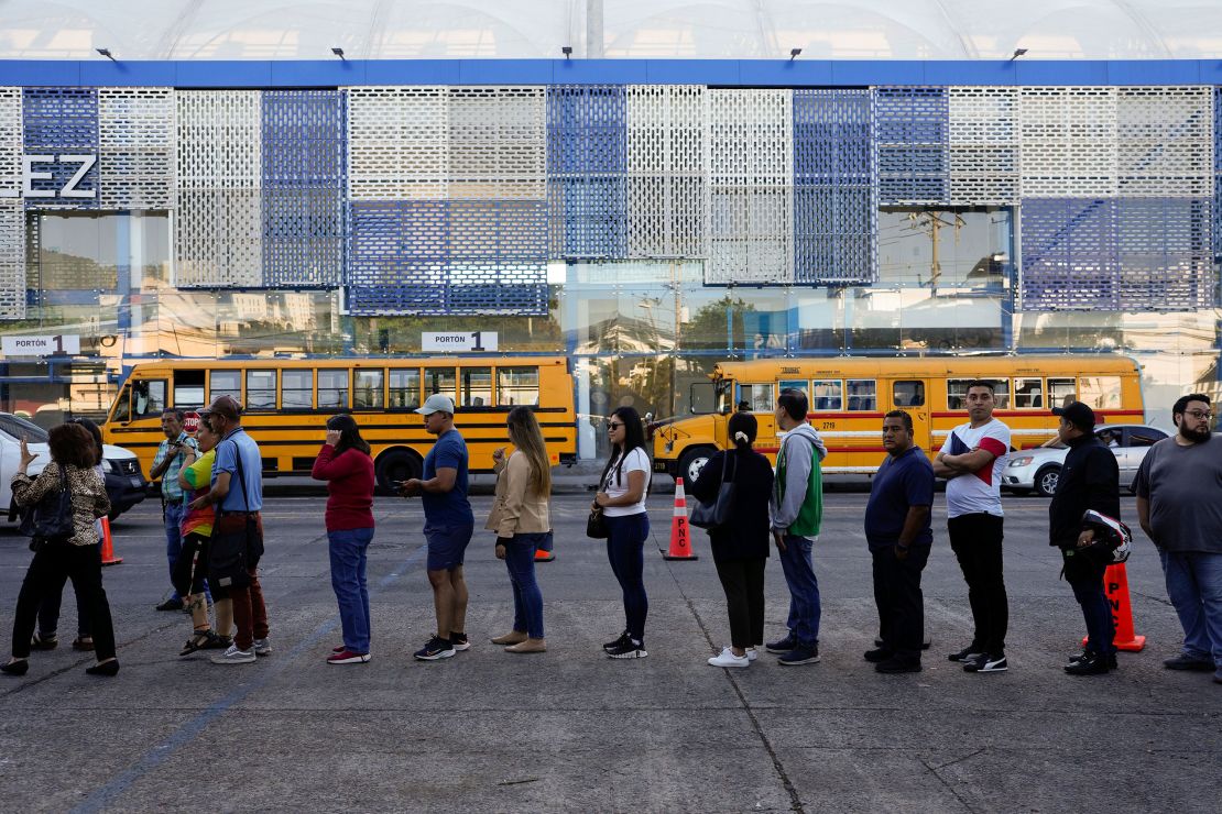 Voters line up at a polling station during general elections in San Salvador, El Salvador, on Sunday.