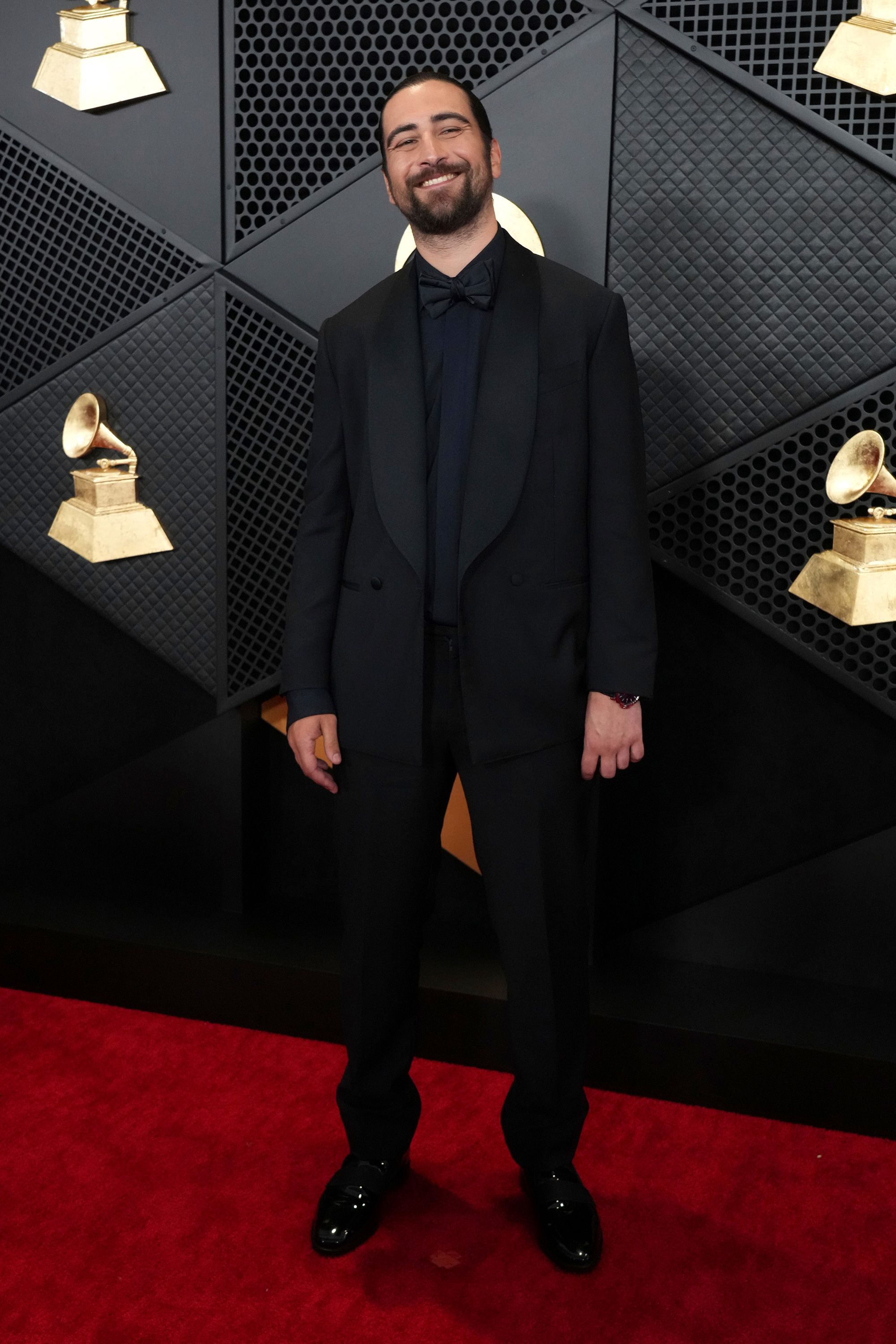 Noah Kahan, nominated in the Best New Artist category, opted for an all-black tuxedo.