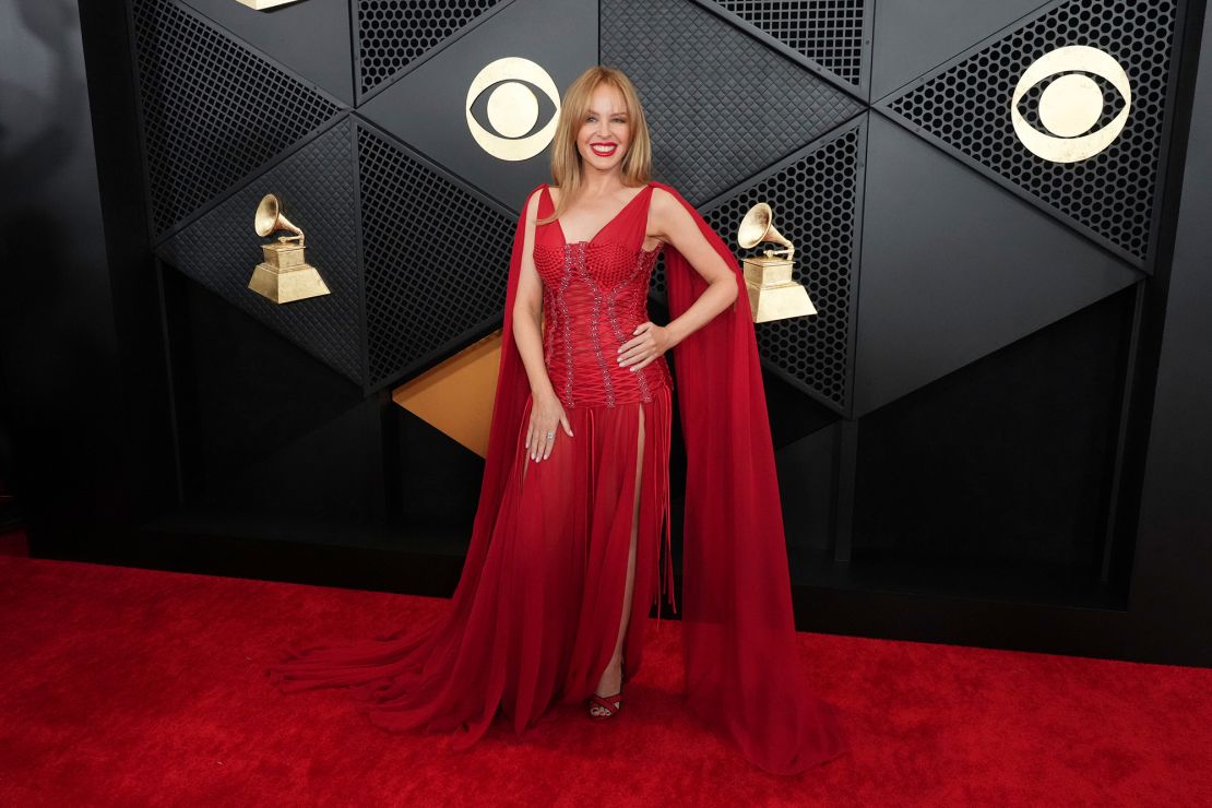 Australian singer Kylie Minogue, who won for Best Pop Dance Recording, wore a red Dolce & Gabbana dress with satin lace weave corset bodice, double shoulder train and Martin Katz jewelry.