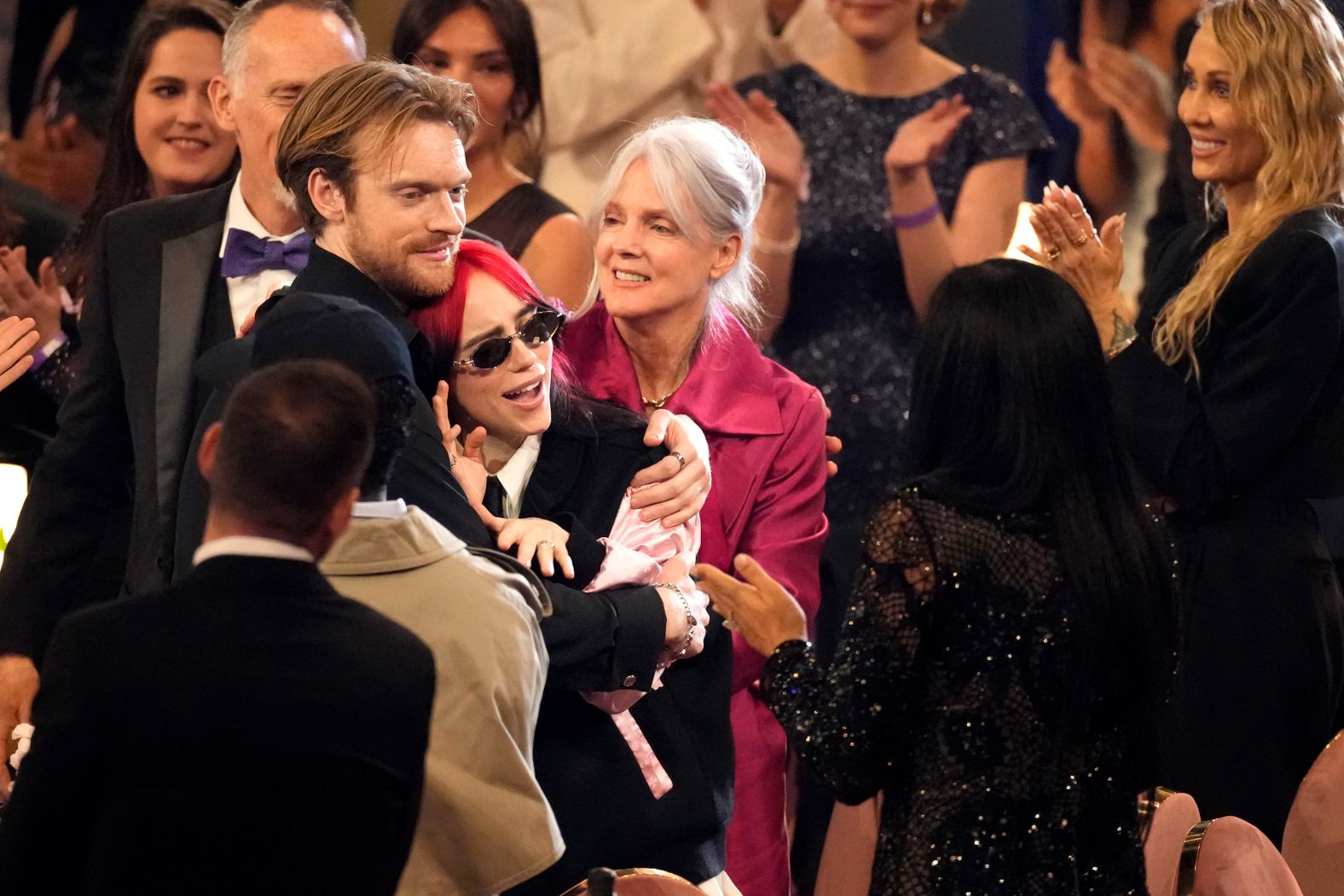 Finneas and Billie Eilish embrace after they won the song of the year Grammy for "What Was I Made For?"