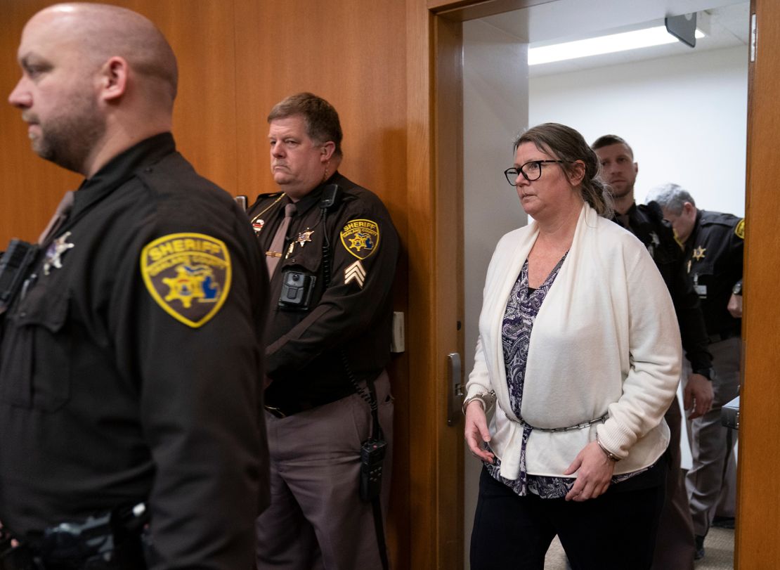 Jennifer Crumbley walks into an Oakland County courtroom Tuesday before being found guilty on four counts of involuntary manslaughter in Pontiac, Michigan.