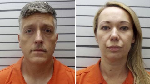 FILE - This combination of booking photos provided by the Muskogee County, Okla., Sheriff's Office shows Jon Hallford, left, and Carie Hallford, the owners of Return to Nature Funeral Home. Prosecutors were set to lay out their case Thursday, Feb. 8, 2024, against Jon Hallford, a former co-owner of the Colorado funeral home where nearly 200 bodies, some of them stacked and partially covered, were found last year in a building infested with flies and maggots. (Muskogee County Sheriff's Office via AP, File)