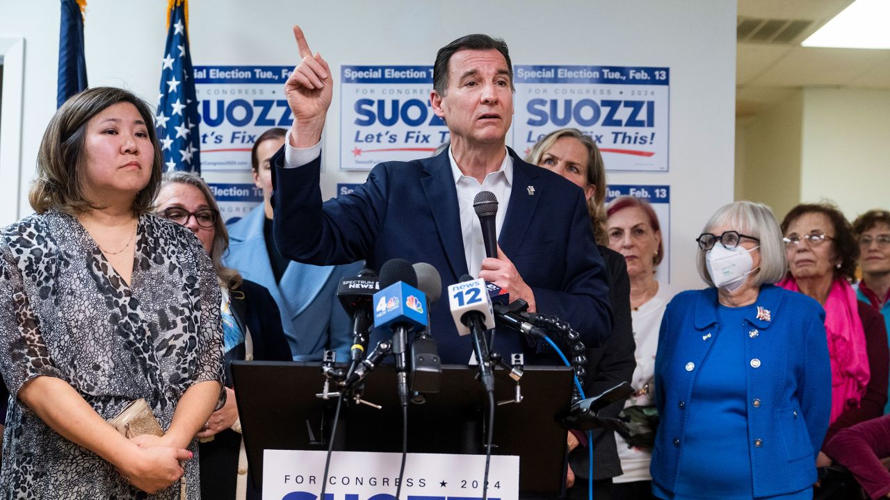 Rep. Tom Suozzi, Democratic candidate for New York's 3rd Congressional District, and Rep. Grace Meng, D-N.Y., left, conduct the "Women For Suozzi Rally," in Port Washington, New York, on Saturday, February 3.