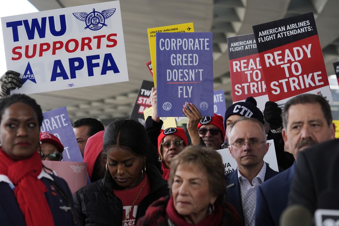 Flight attendants and supporters protest at O'Hare International Airport in Chicago, Tuesday, Feb. 13, 2024. Three separate unions representing flight attendants at major U.S. airlines are picketing and holding rallies at 30 airports on Tuesday as they push for new contracts and higher wages.