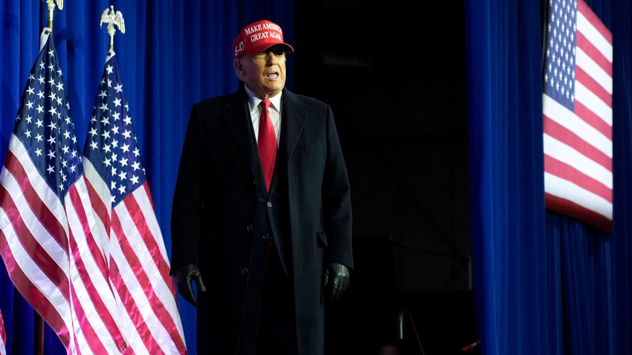 Former President Donald Trump arrives at an election rally in Waterford Township, Michigan, on February 17, 2024.