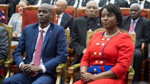 FILE  Haiti's President Jovenel Moise sits with his wife Martine during his swearing-in ceremony at Parliament in Port-au-Prince, Haiti, Tuesday Feb. 7, 2017. A judge investigating the July 2021 assassination of President MoÃ¯se issued a final report on Monday, Feb. 19, 2024, that indicts his widow, Martine MoÃ¯se, ex-prime minister Claude Joseph and the former chief of Haitiâs National Police, LÃ©on Charles, among others. (AP Photo/Dieu Nalio Chery, File)