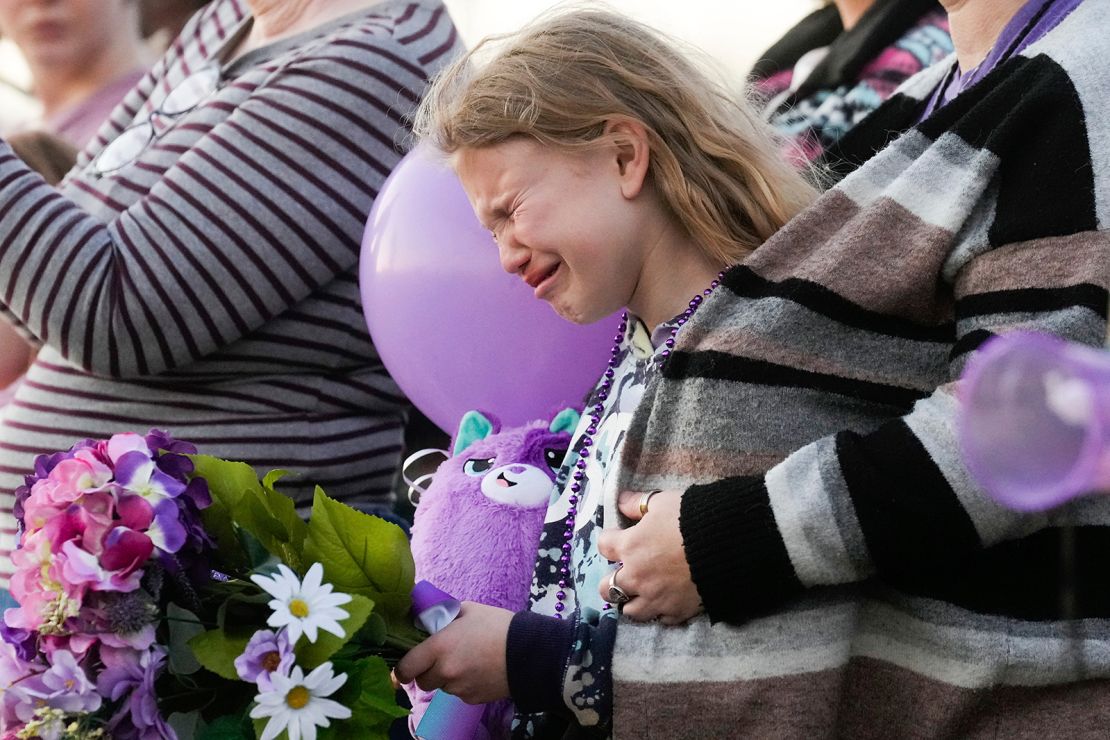 Kristlyn Wood, a cousin of 11-year-old Audrii Cunningham, reacts during a vigil in Cunningham's honor, on February 21 in Livingston, Texas.