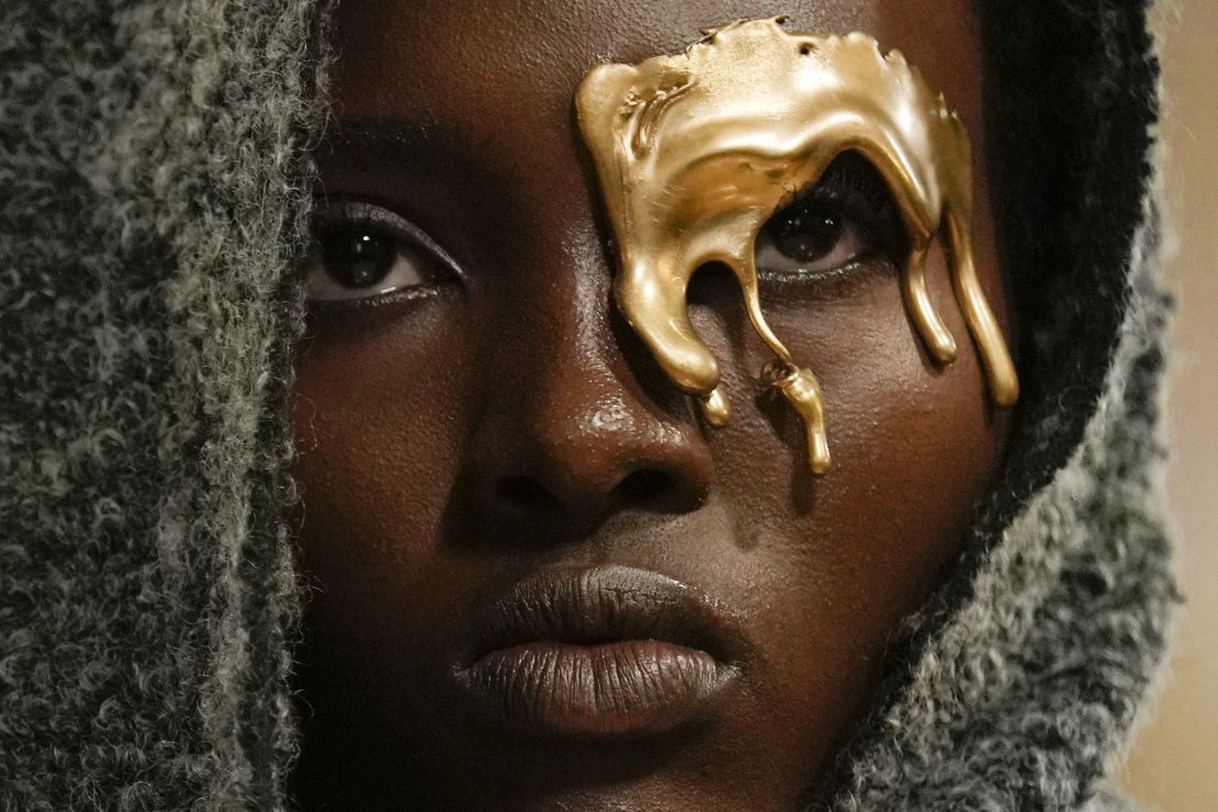 The inventive collection also featured this golden face adornment.