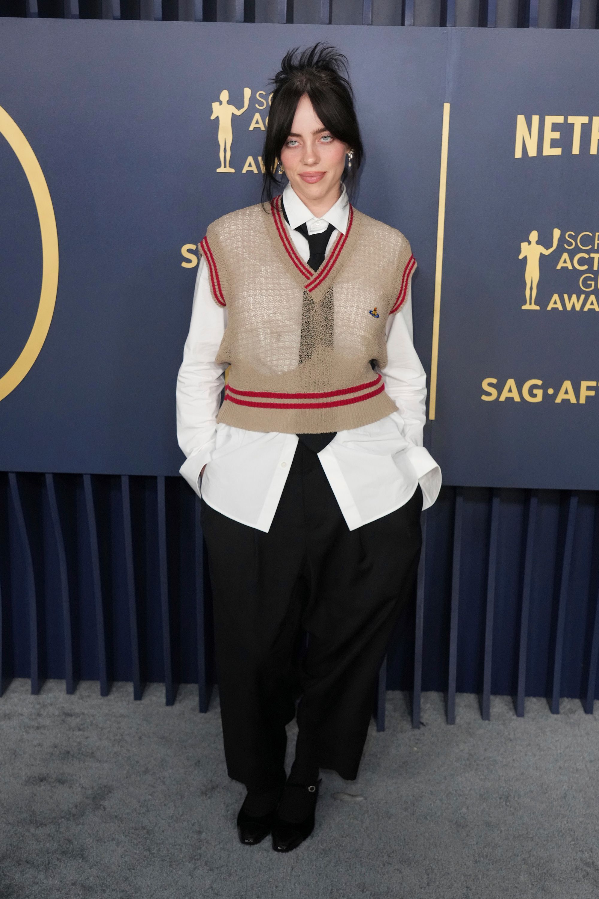 Billie Eilish in a Vivienne Westwood knit and loose suiting.