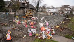 Shown as a makeshift memorial at the scene of a shootout and house fire that killed six members of an extended family in East Lansdowne, Pa., Wednesday, Feb. 28, 2024. (AP Photo/Matt Rourke)