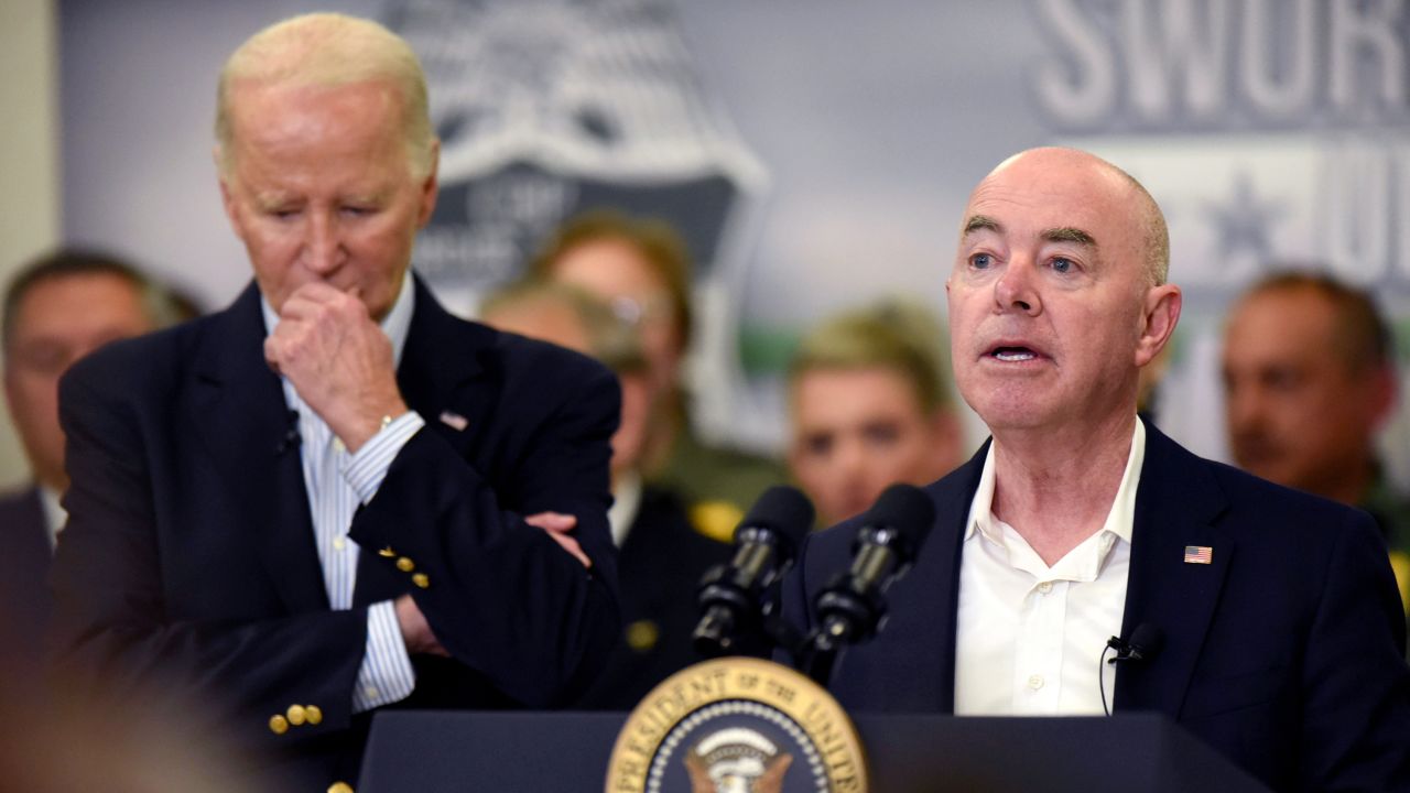 Homeland Security Secretary Alejandro Mayorkas delivers remarks during a visit to the southern border, Thursday, Feb. 29, 2024, in Brownsville, Texas, as President Joe Biden, looks on.