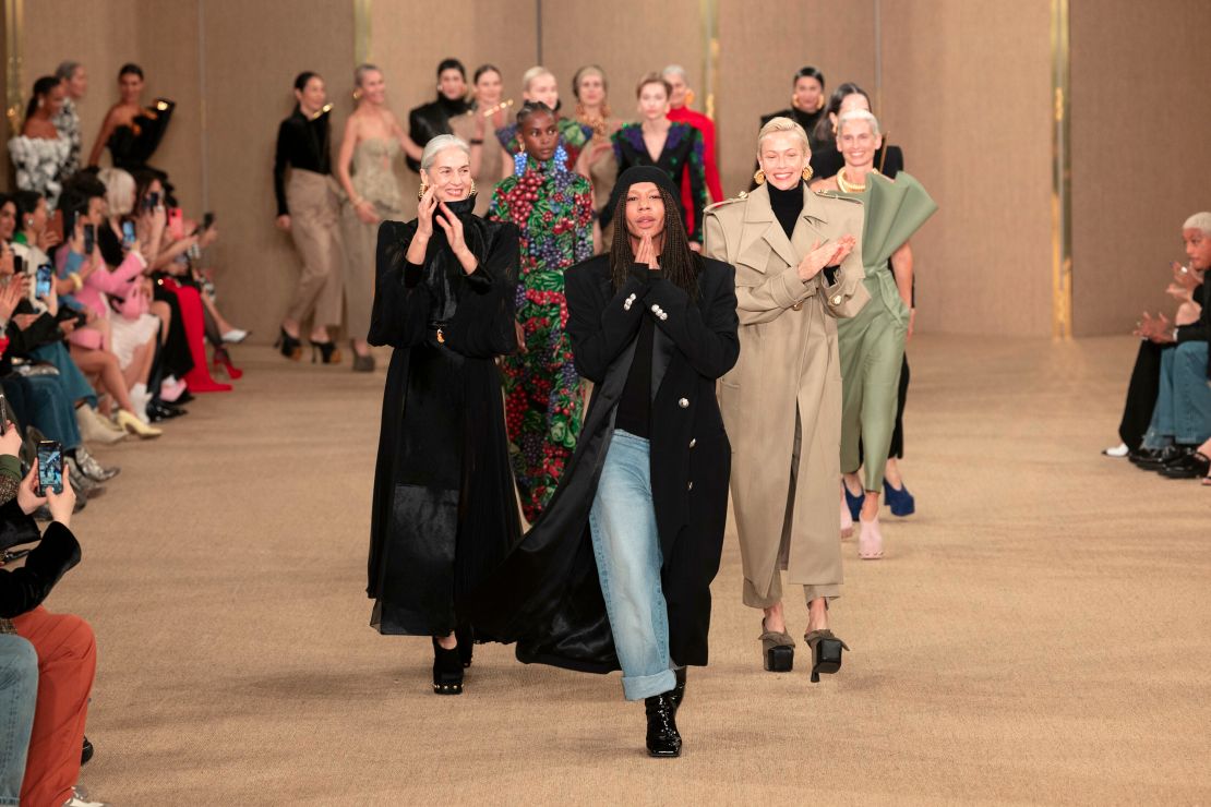 Balmain's long-standing artistic director Olivier Rousteing, takes to the runway at the show's finale.