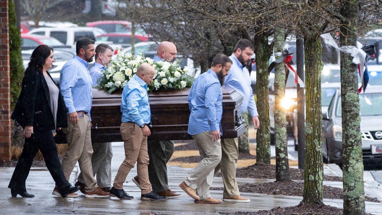 The casket of Laken Riley, the 22-year-old nursing student who was killed last week on the University of Georgia campus, is carried to a hearse following her funeral Friday at Woodstock City Church in Woodstock, Georgia.