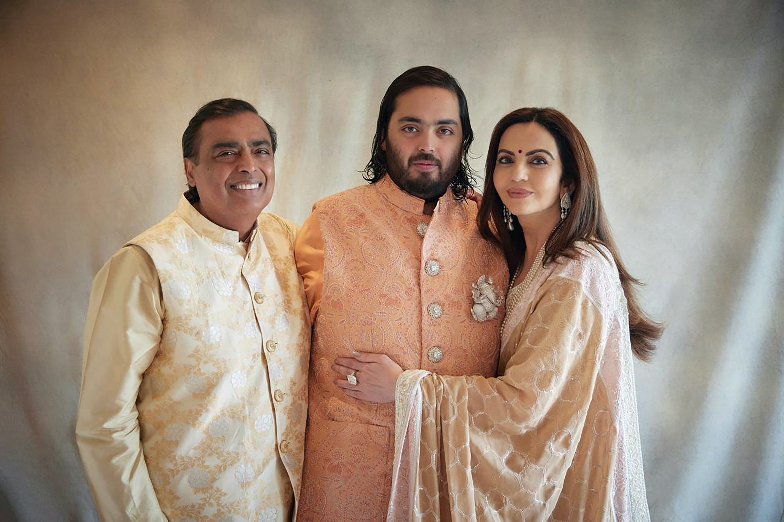 Billionaire industrialist Mukesh Ambani with his son Anant and wife Nita.