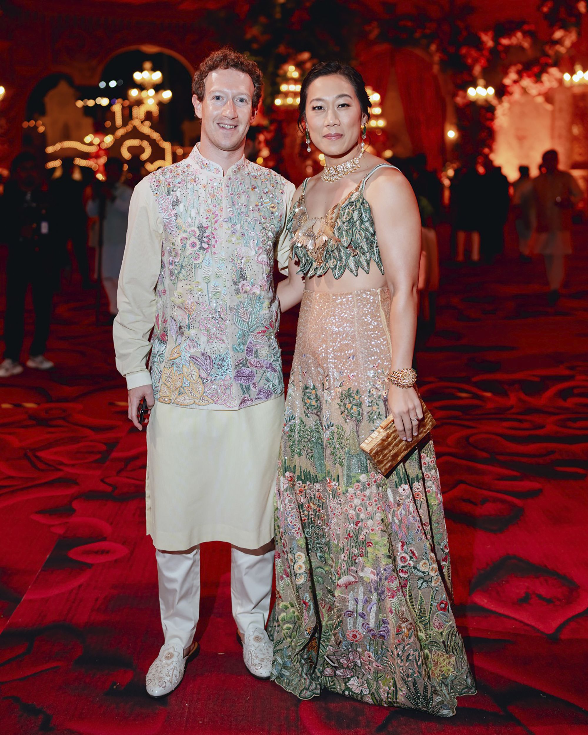 Mark Zuckerberg and his wife Priscilla Chan pose at a pre-wedding bash held for Mukesh Ambani's son Anant Ambani.