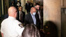 Allen Weisselberg, center, is escorted to Manhattan criminal court, Monday, March 4, in New York. 