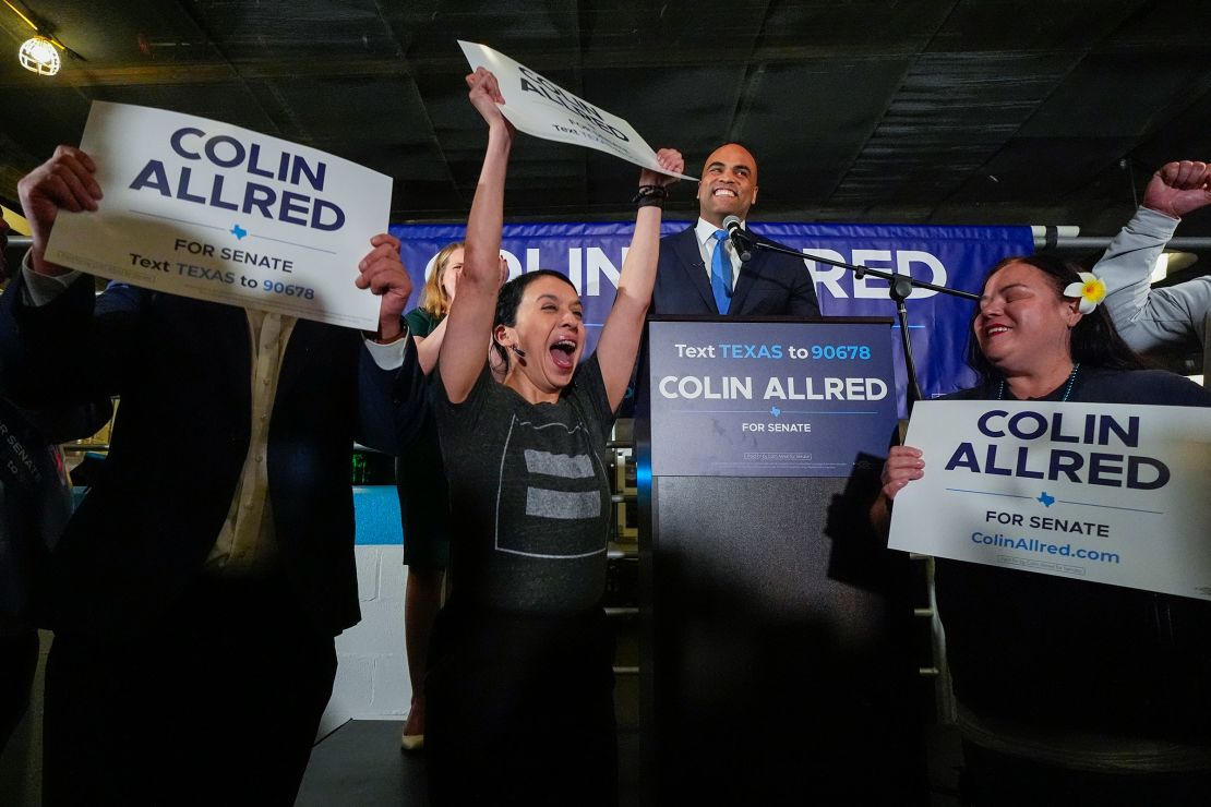 Supporters of Rep. Colin Allred react as he addresses them during an election night gathering on Tuesday in Dallas.