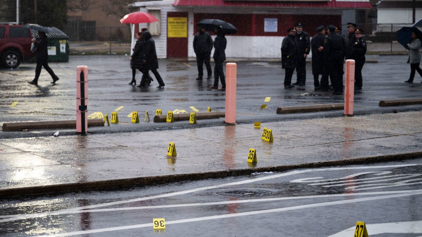 Evidence markers are seen following a shooting in Northeast Philadelphia on March 6.