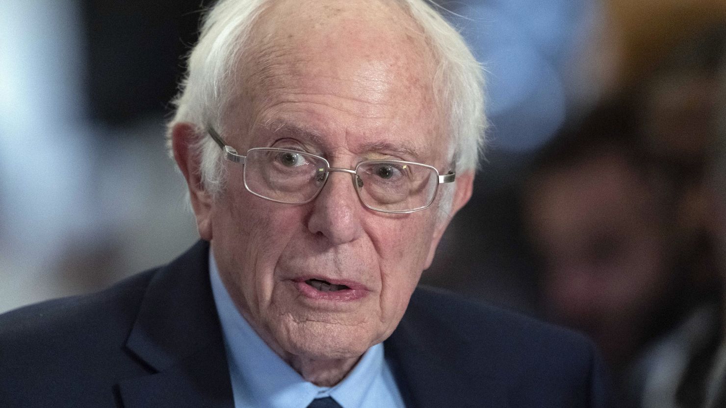 Sen. Bernie Sanders, I-Vt., talks to the media as he walks to the House chamber before President Joe Biden's State of the Union address at the U.S. Capitol Thursday, March 7, 2024, in Washington.