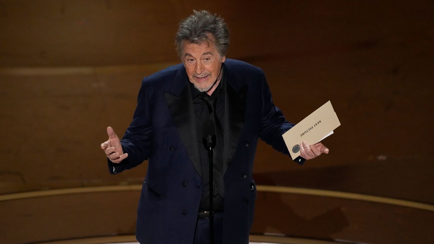 Al Pacino presents the award for best picture during the Oscars on Sunday, March 10.