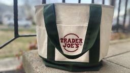 A Trader Joe's mini tote bag is shown in Palmyra, N.J., on Wednesday, March 13, 2024. The bag is the latest item to cause a stir on social media, so much so that resellers are taking advantage of the hype.