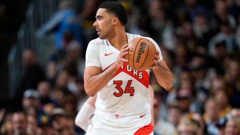 Jontay Porter, then a center for the Toronto Raptors, plays against the Denver Nuggets in Denver on March 11.
