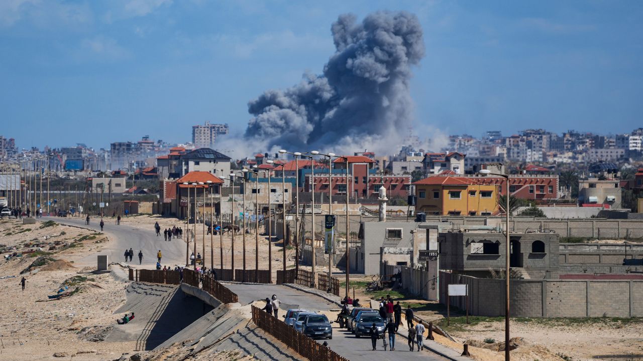 Smoke rises following an Israeli airstrike in the central Gaza Strip on Friday, March 15.