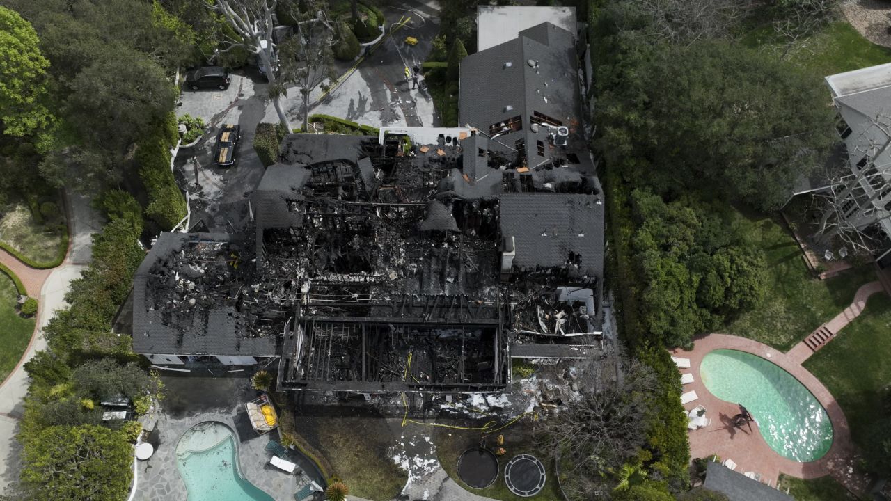 An aerial view of a fire-damaged property, which appears to belong to Cara Delevingne, on Friday in Studio City.
