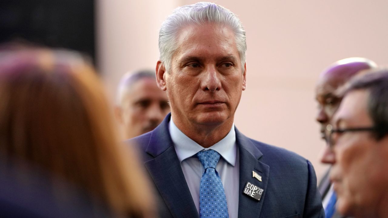 FILE - Cuba President Miguel Diaz-Canel walks through the COP28 U.N. Climate Summit, Saturday, Dec. 2, 2023, in Dubai, United Arab Emirates. Small groups of protesters took to the streets in the eastern city of Santiago on Sunday, March 18, 2024, decrying power outages lasting up to eight hours and food shortages across Cuba. President Miguel DÃ­az-Canel also referred to protests in a social media post, though he did not specify where they occurred.(AP Photo/Peter Dejong, File)