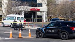 A police vehicle is parked outside Saint Alphonsus Regional Medical Center in Boise, Idaho, on Wednesday, March 20, 2024.   Three Idaho corrections officers were shot as a suspect staged a brazen attack to break Skylar Meade, a prison inmate out of the Boise hospital overnight. Two of the officers were shot by the suspect early Wednesday. The third was shot and wounded by a police officer when police mistook the correctional officer for the suspect.  (Sarah A. Miller/Idaho Statesman via AP)