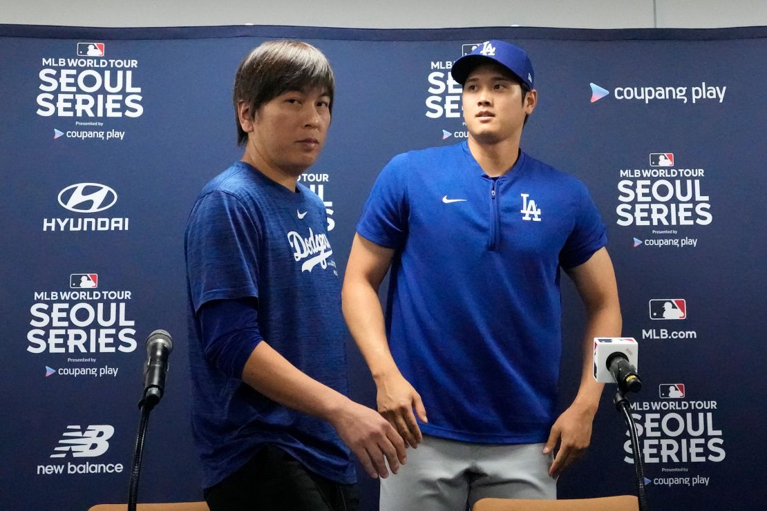 Ippei Mizuhara, left, the then-interpreter for Los Angeles Dodgers star Shohei Ohtani, right, leave a news conference on March 16. Mizuhara was later fired amid allegations of illegal gambling.