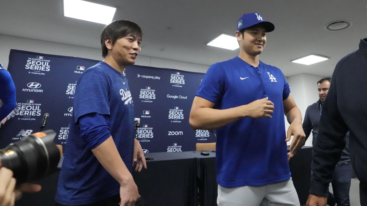 Los Angeles Dodgers player Shohei Ohtani, right, and his interpreter, Ippei Mizuhara, leave after a news conference at Gocheok Sky Dome in Seoul, South Korea, on March 16, 2024.
