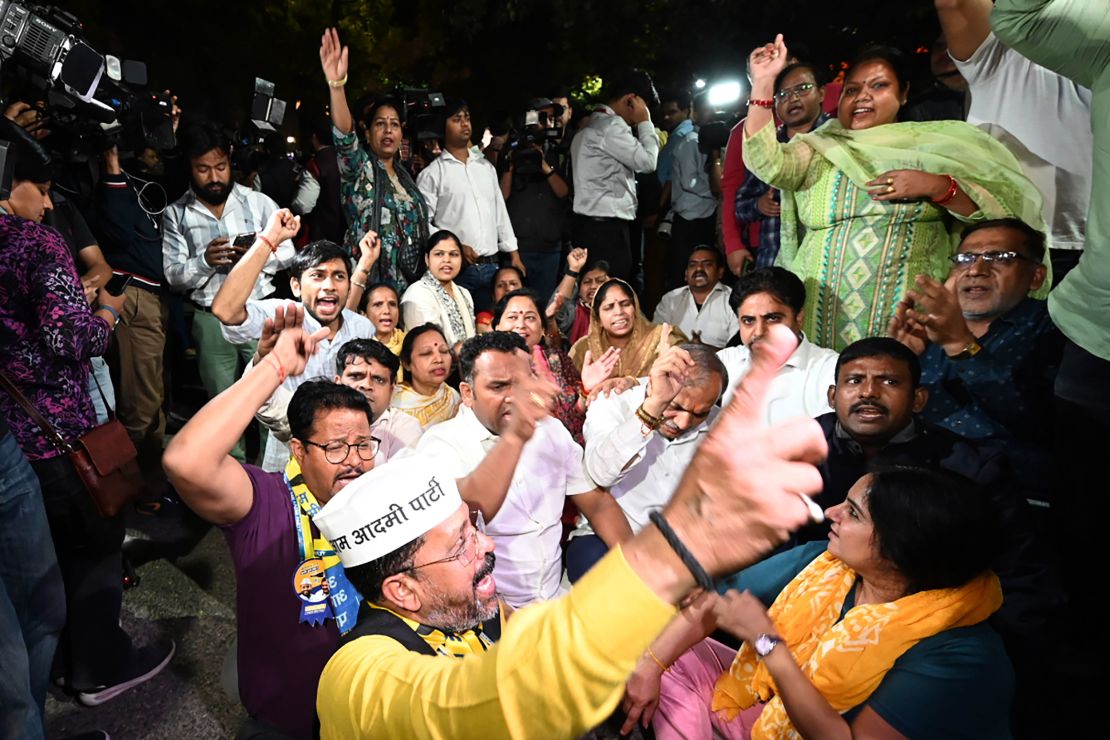 Aam Aadmi Party supporters protest as Enforcement Directorate personnel arrive to arrest their leader Arvind Kejriwal at his home in New Delhi, India, on March 21, 2024.