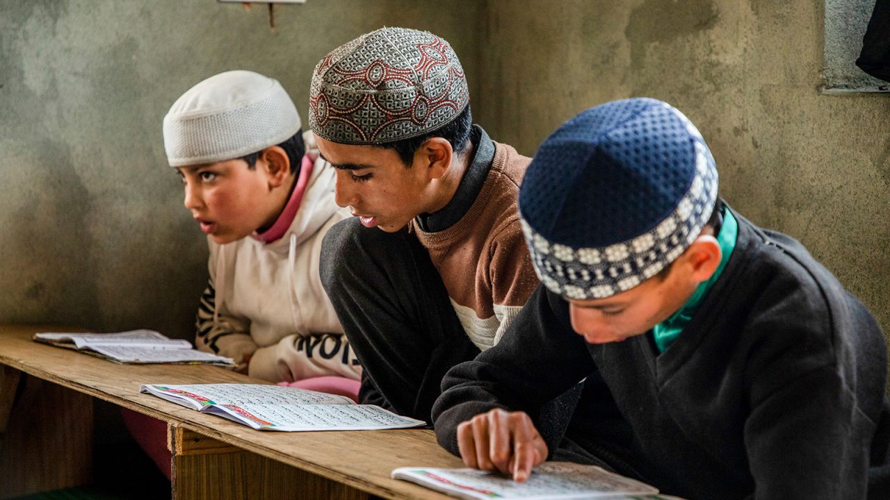Muslim students read the Quran at an Islamic school or madrasa in Srinagar, Indian-administered Kashmir.