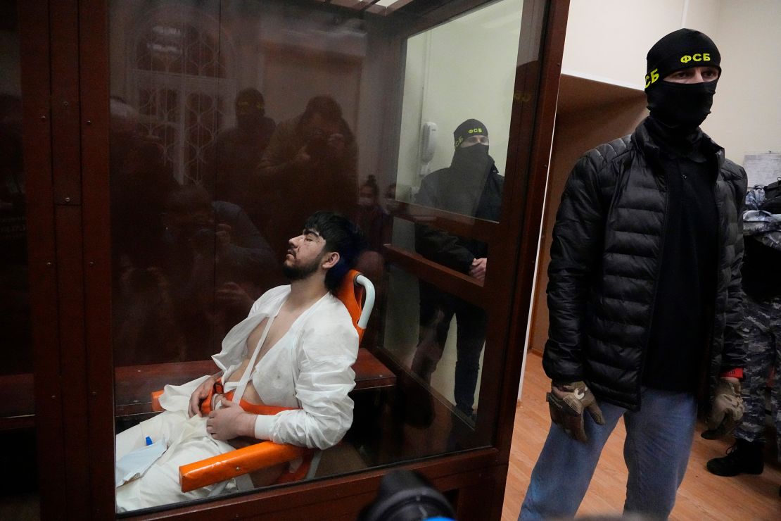 A suspect in Friday's shooting at the Crocus City Hall sits in a wheelchair in the Basmanny District Court in Moscow, Russia, Sunday, March 24, 2024.