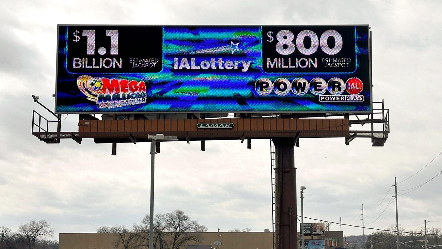 A billboard advertises the Mega Millions and Powerball jackpots on Monday in Des Moines, Iowa.