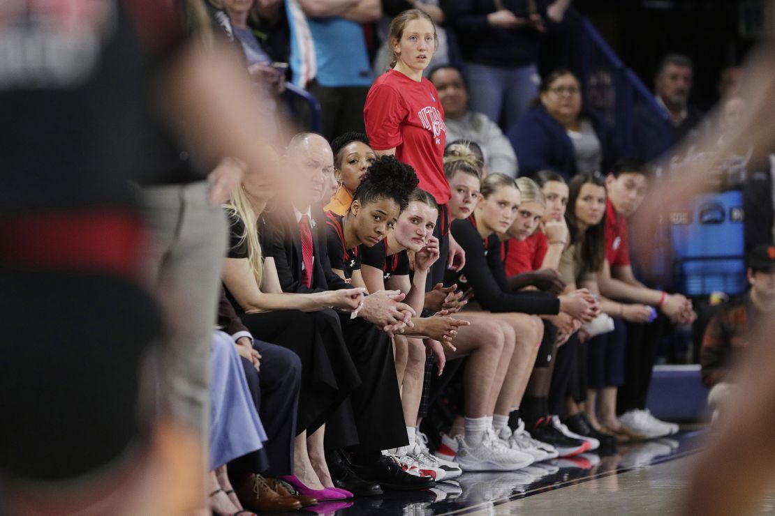Players and staff on the Utah bench watch Gonzaga.