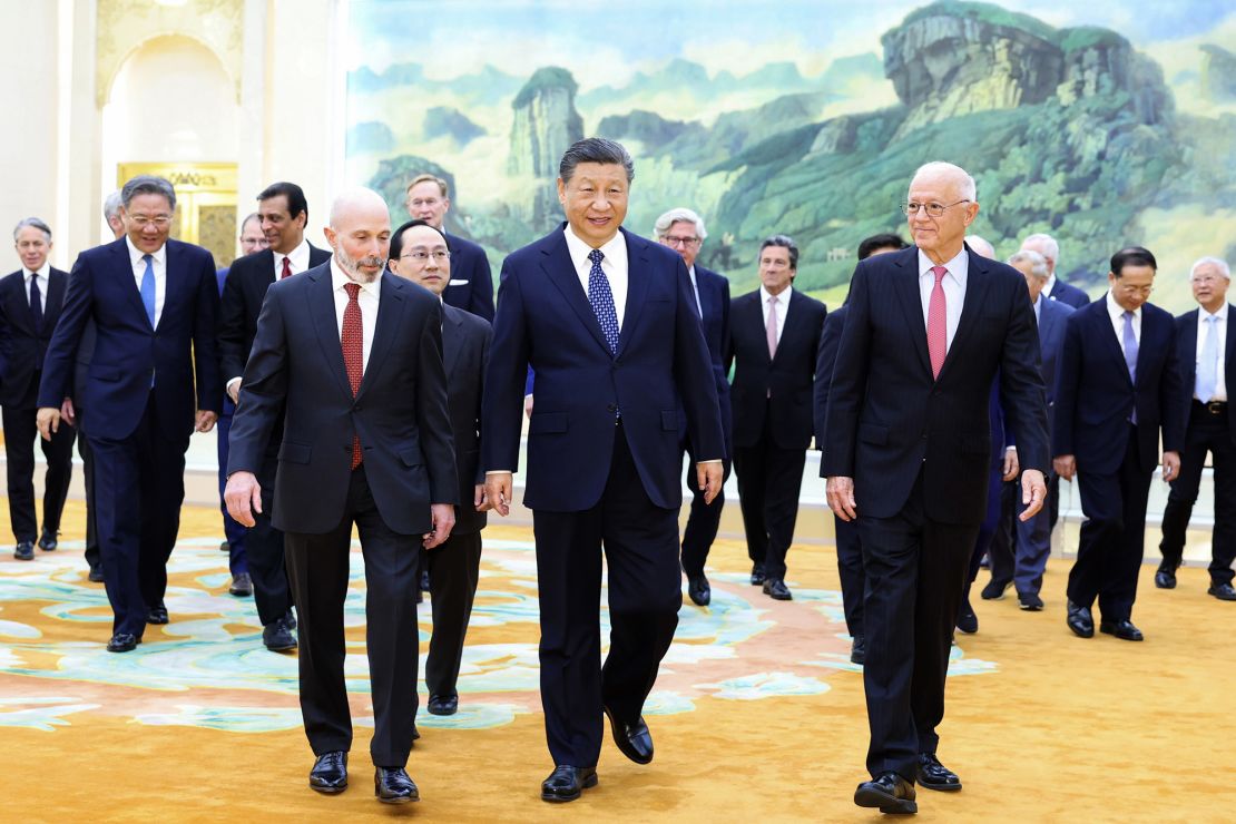 Chinese President Xi Jinping, center, pictured with American CEOs and academics at the Great Hall of the People in Beijing, on March 27, 2024.