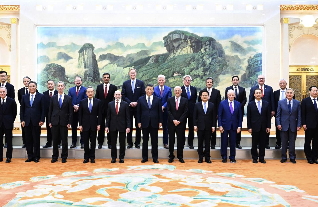 Xi and his American guests pose for a photo before the meeting.