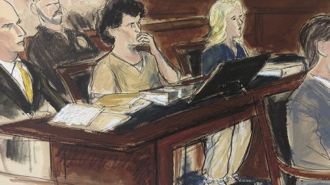 In this courtroom sketch, Sam Bankman-Fried, center, sits at the defense table wearing leg shackles during his sentencing in Manhattan federal court, Thursday, March. 28, 2024, in New York. Crypto entrepreneur Bankman-Fried was sentenced Thursday to 25 years in prison for a massive fraud that unraveled with the collapse of FTX, once one of the world's most popular platforms for exchanging digital currency.