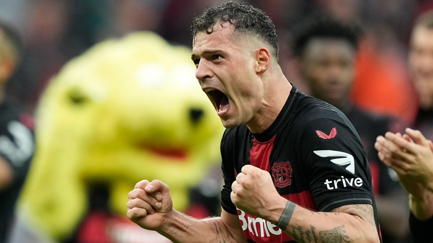 Bayer Leverkusen's Granit Xhaka celebrates after completing a comeback victory against Hoffenheim on Saturday.