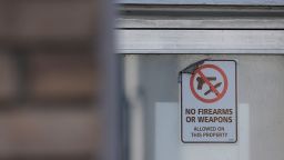 A "No Firearms or Weapons Allowed on This Property" sign in Houston, Texas, onMarch 29, 2024.