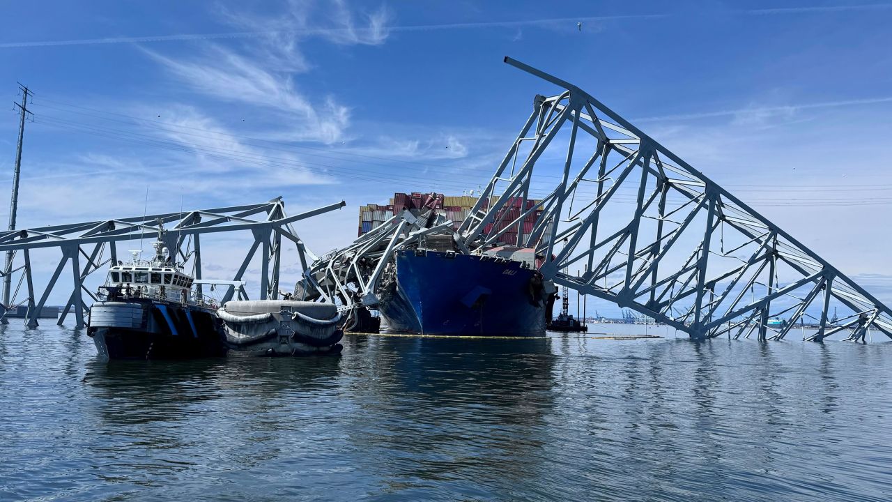 The fallen Francis Scott Key Bridge in Baltimore is pictured Sunday, March 31, 2024, where divers assisted crews with the complicated and meticulous operation of removing steel and concrete. (AP Photos/Mike Pesoli)