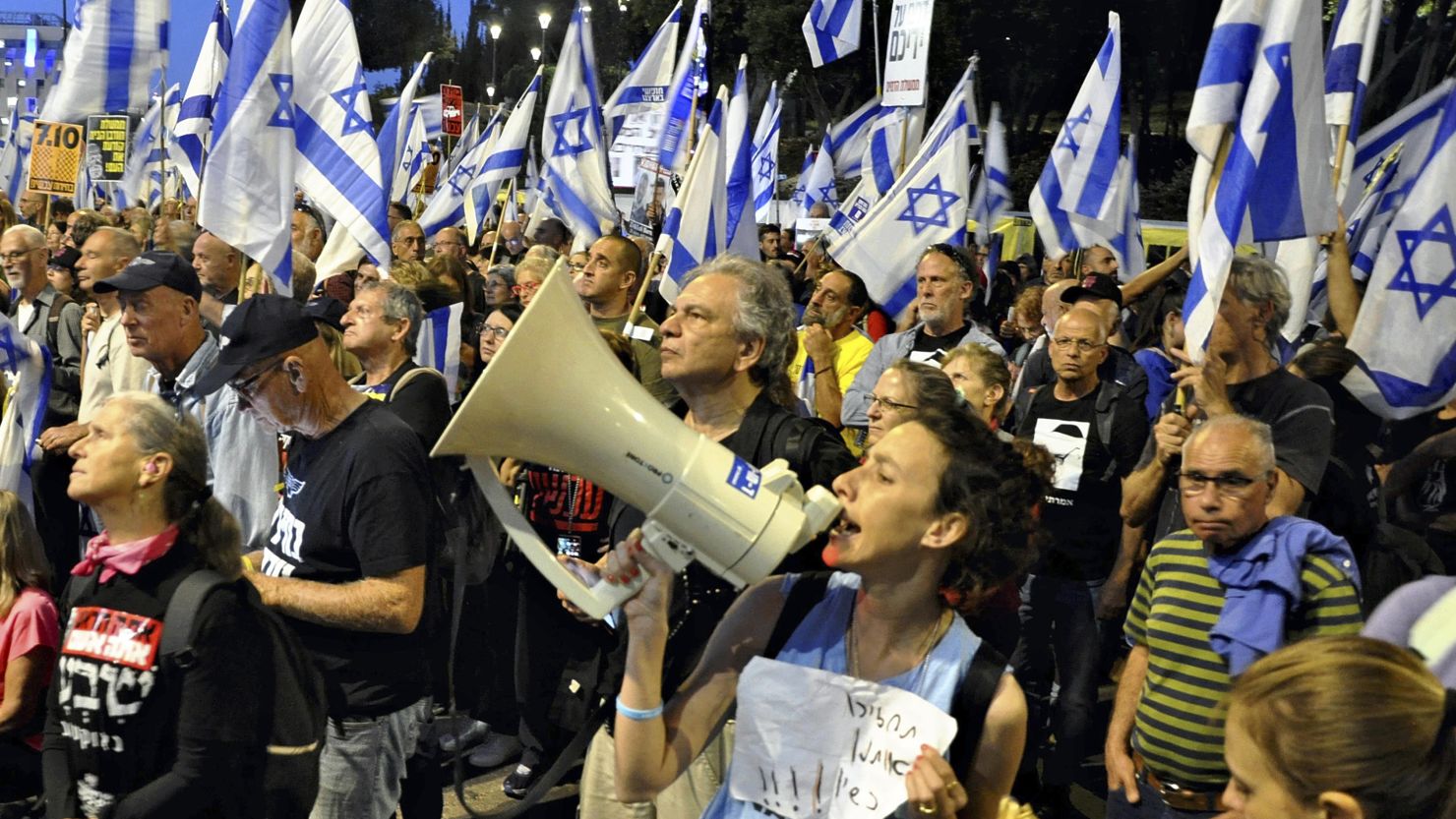 People protest against Israeli Prime Minister Benjamin Netanyahu's government and call for his retirement outside of the Knesset, Israel's parliament, in Jerusalem on March 31, 2024. It was the largest demonstration since the beginning of the conflict with Hamas in the Gaza Strip October 2023. ( The Yomiuri Shimbun via AP Images )