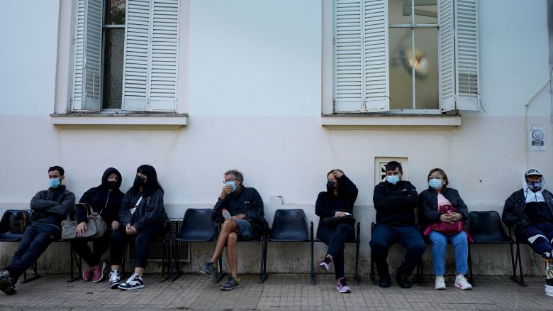 Patients with dengue symptoms wait to be attended at a hospital amid a surge in cases nationwide in Buenos Aires, Argentina, Friday, April 5, 2024. (AP Photo/Natacha Pisarenko)