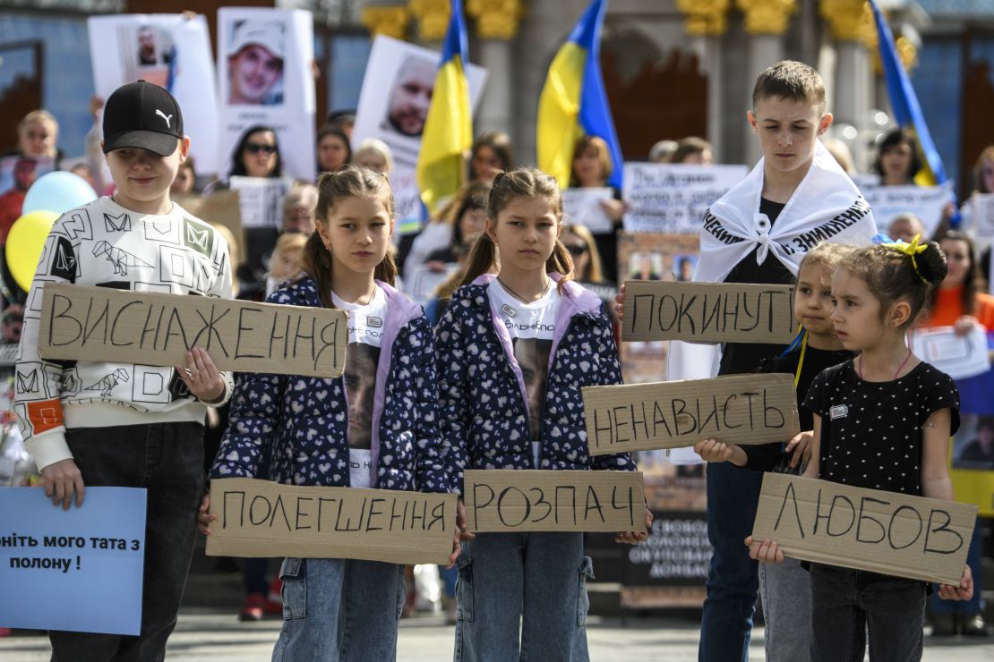 Relatives and friends of civilian Ukrainians held captive in Russia attend a protest in Kyiv, Ukraine, in 2024.