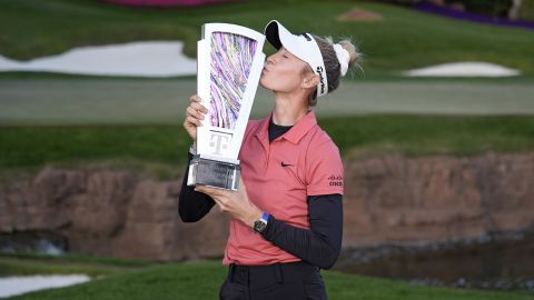 Nelly Korda kisses the trophy after winning the LPGA T-Mobile Match Play in Las Vegas.