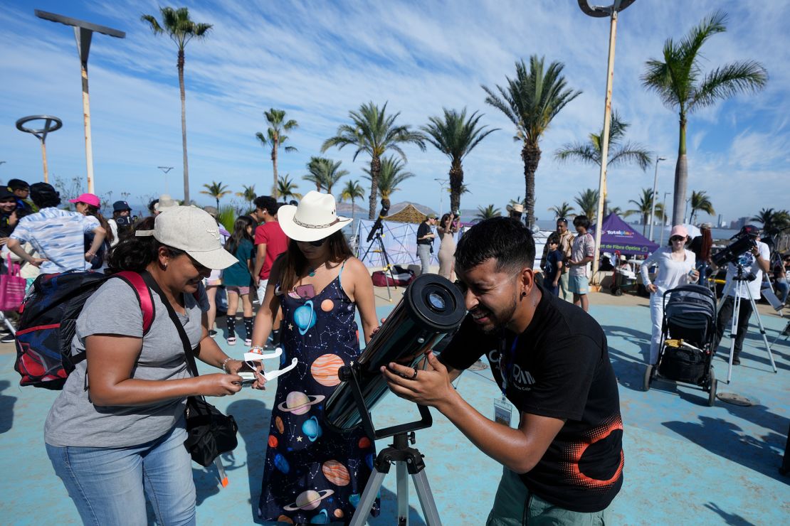 Amateur astronomers prepare to watch a total solar eclipse in Mazatlan, Mexico, Monday, April 8, 2024. (AP Photo/Fernando Llano)